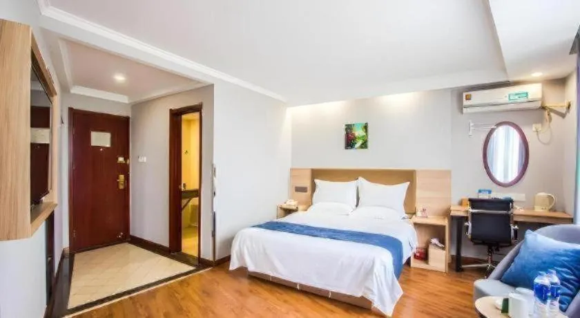 Bed in GreenTree Inn Jiaxing Tongxiang Tudian Express Hotel