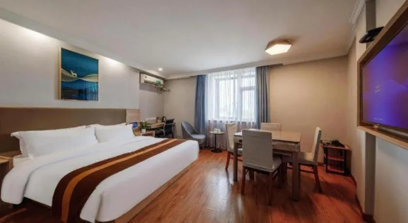 Bed in GreenTree Inn Jiaxing Tongxiang Tudian Express Hotel