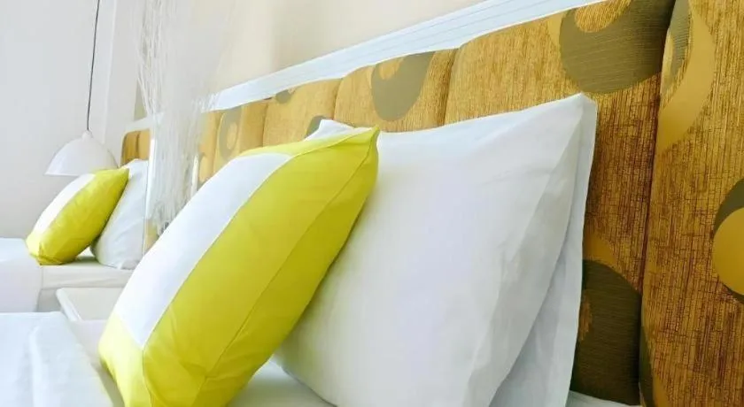 Bed in Golden Ant Hotels