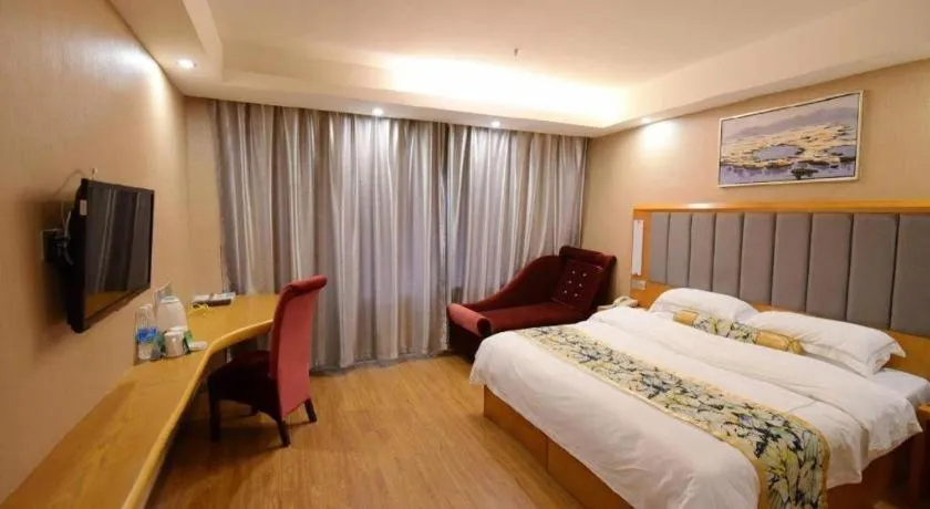 Bed in GreenTree Inn Taizhou Gaogang District Business Hotel