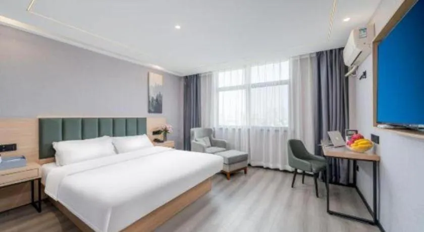 Bed in GreenTree Inn Taizhou Gaogang District Business Hotel