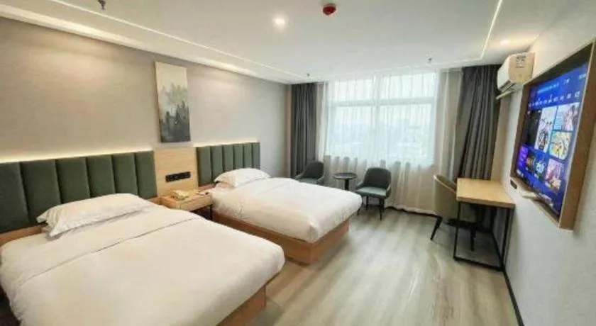 Bed in GreenTree Inn Taizhou Gaogang District Business Hotel