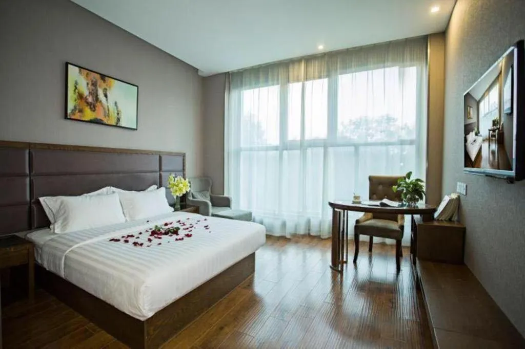 Bed in GreenTree Inn Taizhou Gaogang District Business Hotel