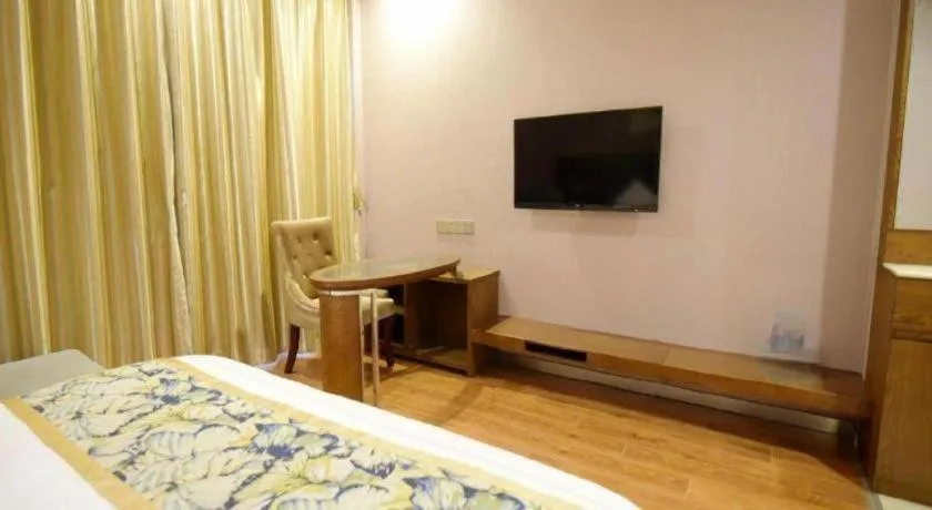 Bed in GreenTree Inn Taizhou Gaogang District Business Hotel