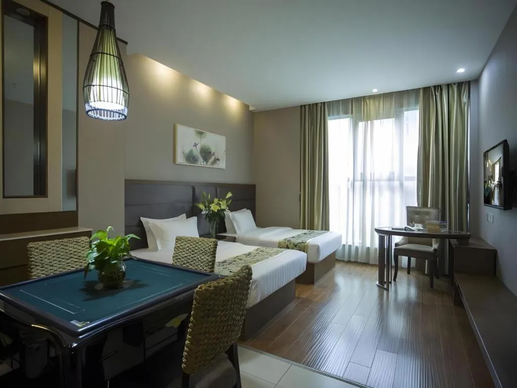 Bed in GreenTree Inn Taizhou Gaogang District Business Hotel