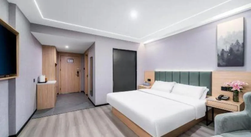 Bed in GreenTree Inn Taizhou Gaogang District Business Hotel