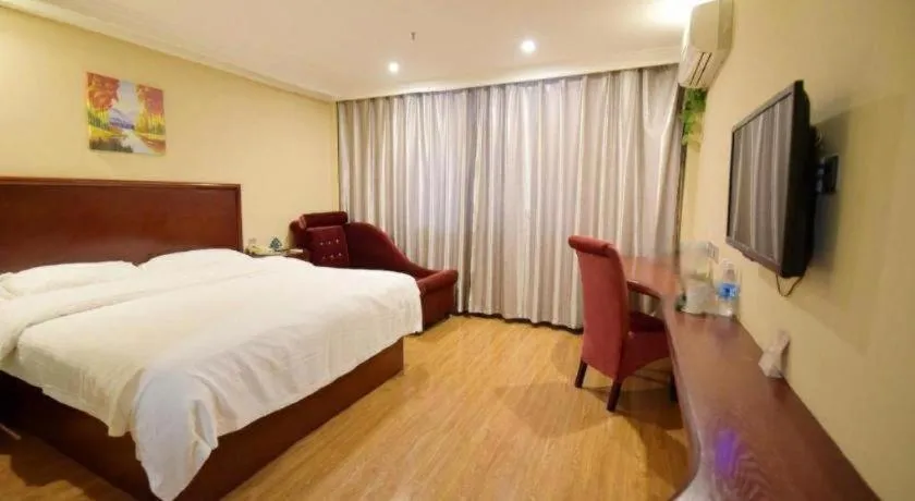 Bed in GreenTree Inn Taizhou Gaogang District Business Hotel