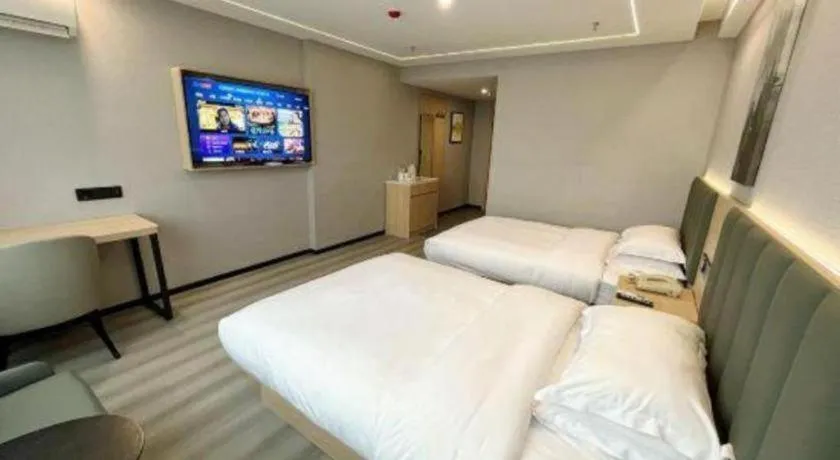 Bed in GreenTree Inn Taizhou Gaogang District Business Hotel