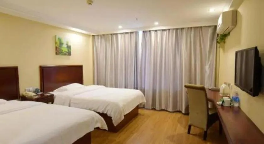 Bed in GreenTree Inn Taizhou Gaogang District Business Hotel