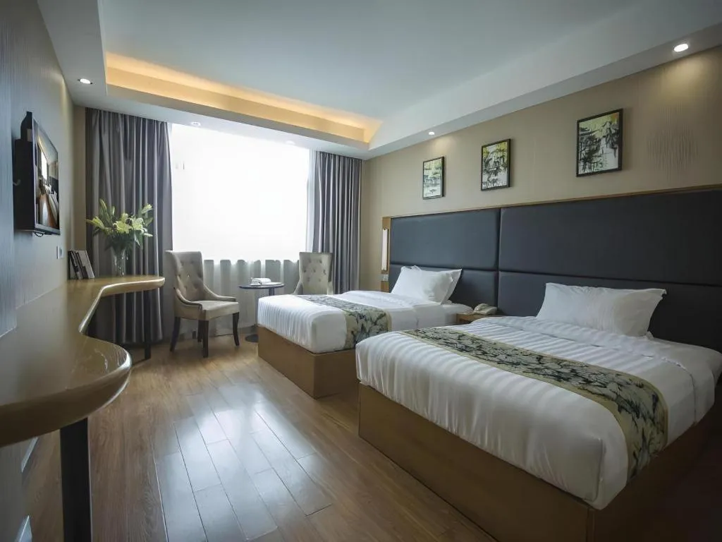 Bed in GreenTree Inn Taizhou Gaogang District Business Hotel