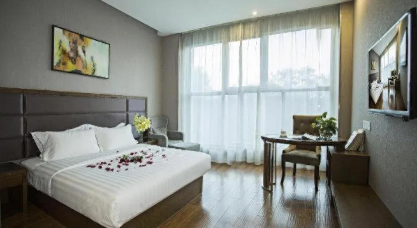 Bed in GreenTree Inn Taizhou Gaogang District Business Hotel