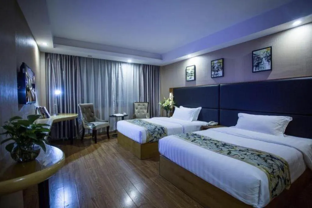 Bed in GreenTree Inn Taizhou Gaogang District Business Hotel
