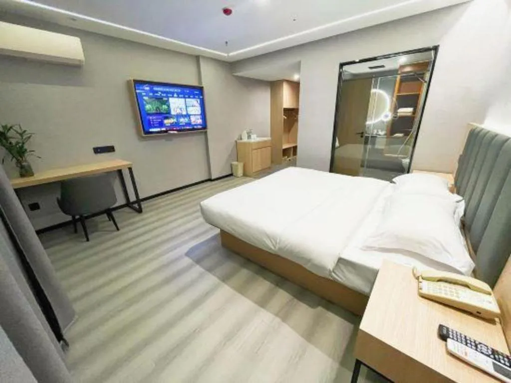 Bed in GreenTree Inn Taizhou Gaogang District Business Hotel