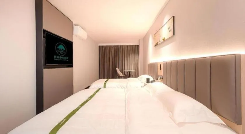 Bed in GreenTree Inn xinghua Middle Yingwu Road Express Hotel