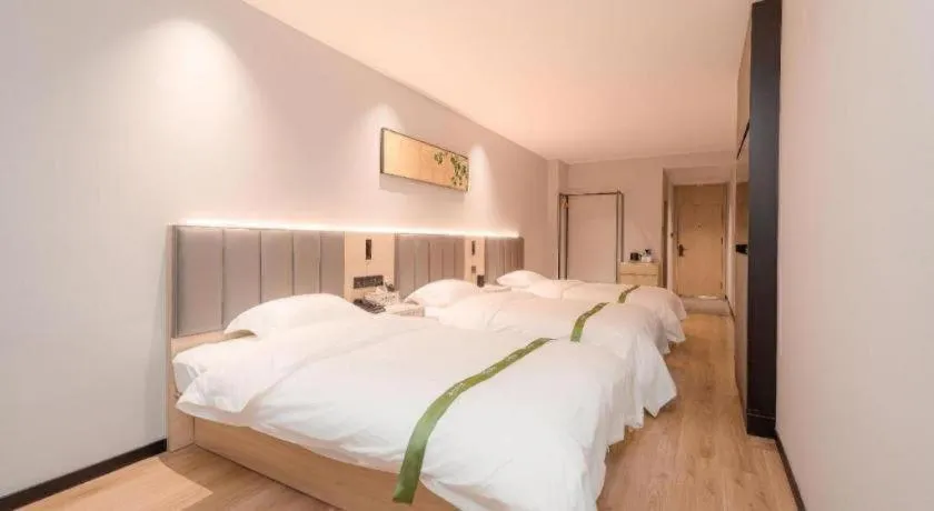 Bed in GreenTree Inn xinghua Middle Yingwu Road Express Hotel