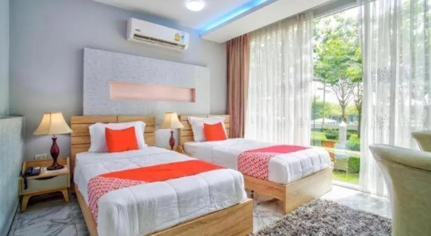 Bed in Thaiasia Goldensea Resort