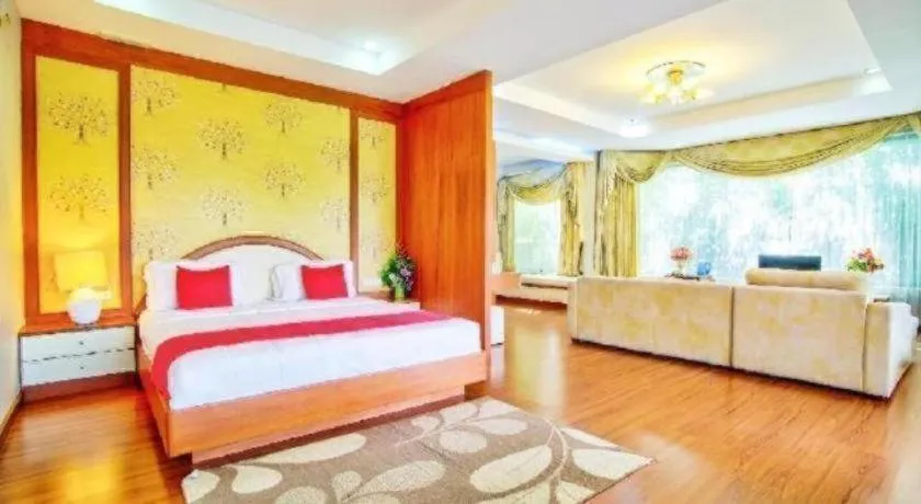 Bed in Thaiasia Goldensea Resort