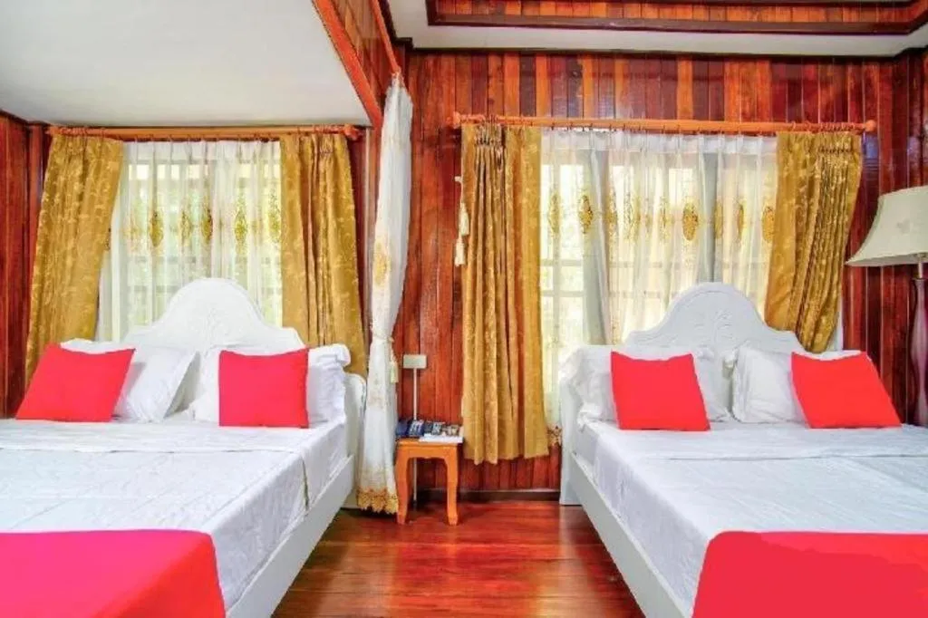 Bed in Thaiasia Goldensea Resort