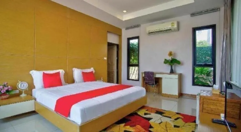 Bed in Thaiasia Goldensea Resort