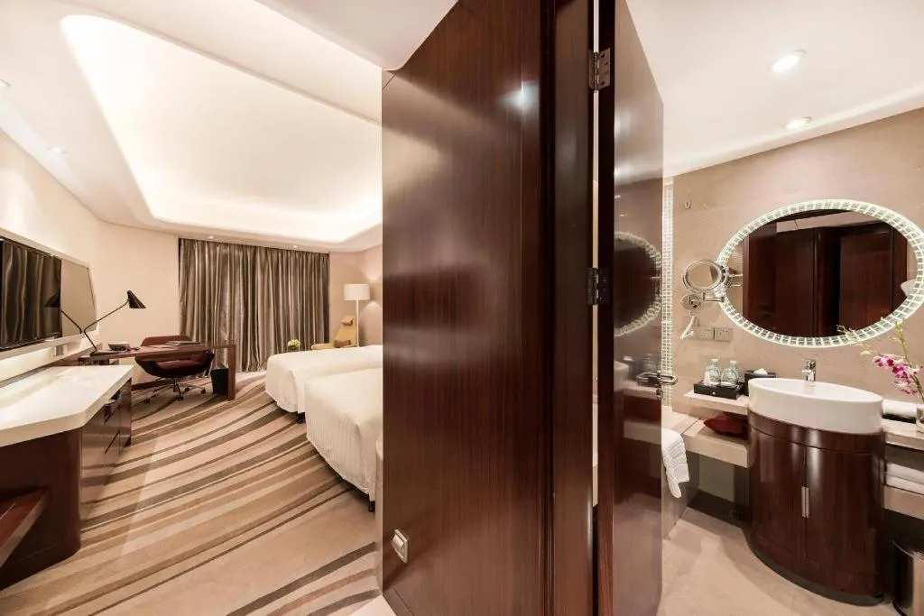 Bed in Hotel Maxmelim Beijing