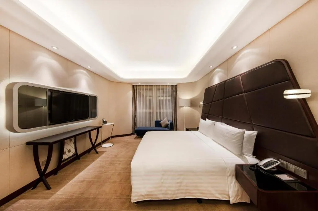 Bed in Hotel Maxmelim Beijing