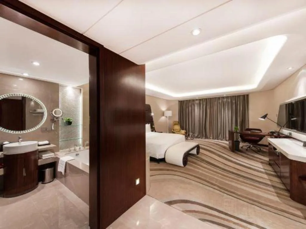 Bed in Hotel Maxmelim Beijing