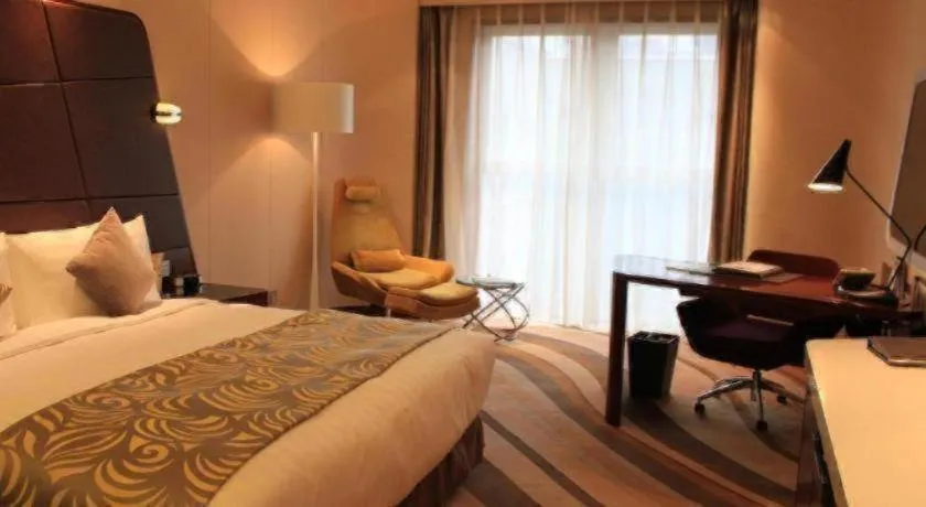 Bed in Hotel Maxmelim Beijing