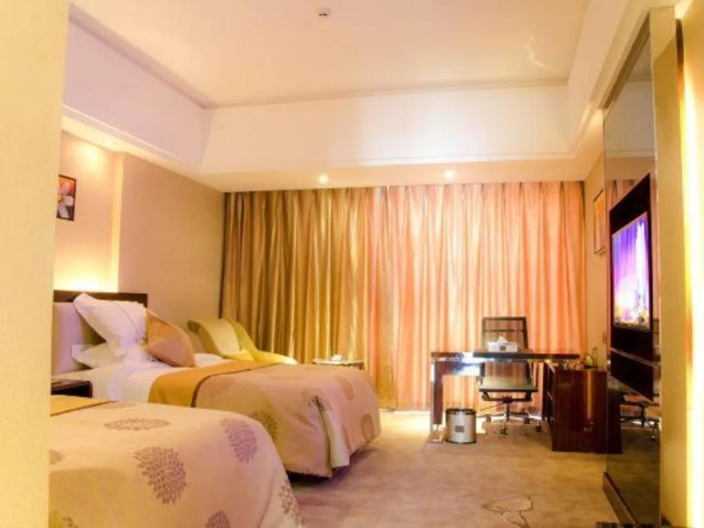 Bed in Xin Sheng Da Hong Sheng International Hotel