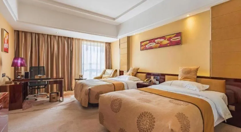 Bed in Xin Sheng Da Hong Sheng International Hotel