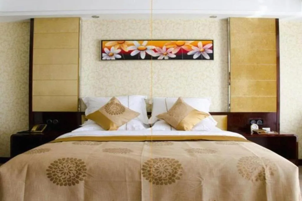 Bed in Xin Sheng Da Hong Sheng International Hotel
