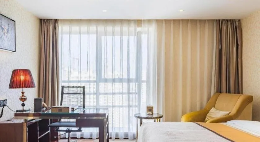 Bed in Xin Sheng Da Hong Sheng International Hotel