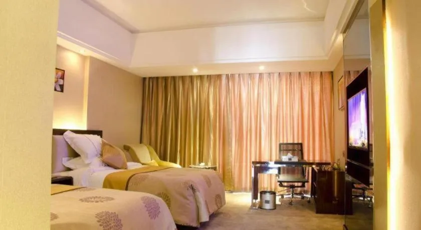 Bed in Xin Sheng Da Hong Sheng International Hotel