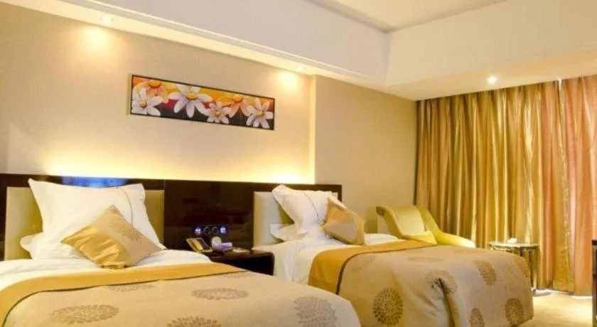 Bed in Xin Sheng Da Hong Sheng International Hotel