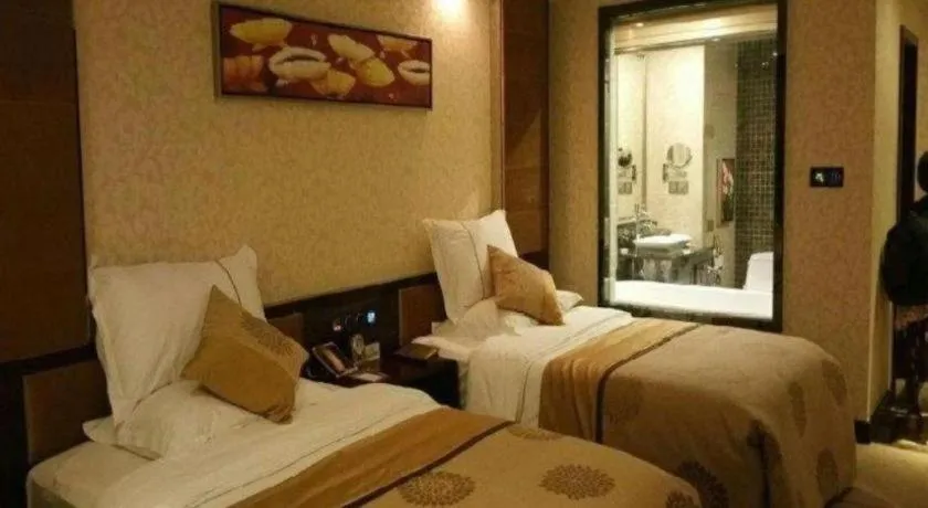Bed in Xin Sheng Da Hong Sheng International Hotel