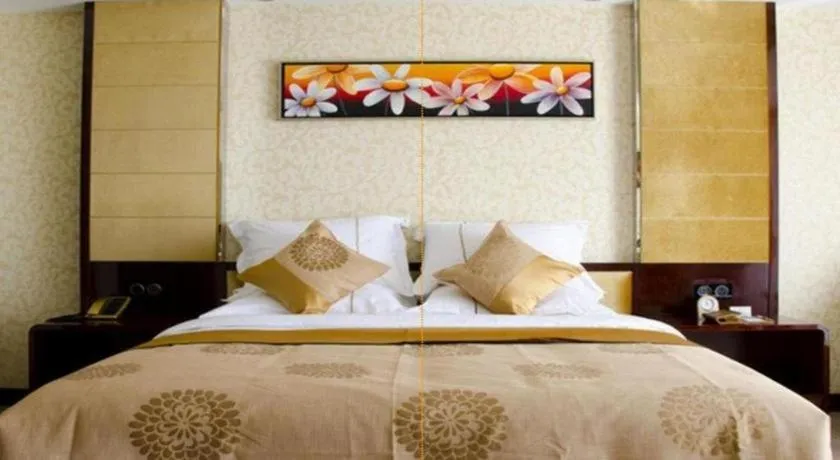 Bed in Xin Sheng Da Hong Sheng International Hotel