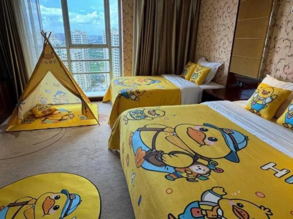 Bed in Xin Sheng Da Hong Sheng International Hotel