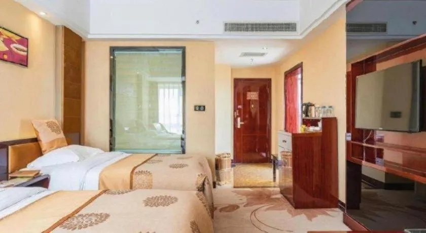 Bed in Xin Sheng Da Hong Sheng International Hotel