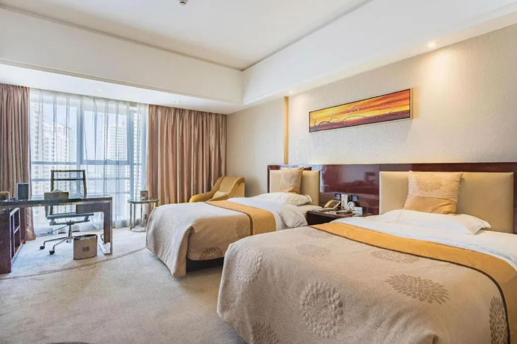 Bed in Xin Sheng Da Hong Sheng International Hotel