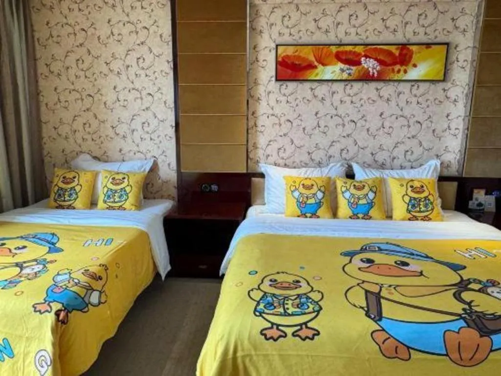 Bed in Xin Sheng Da Hong Sheng International Hotel