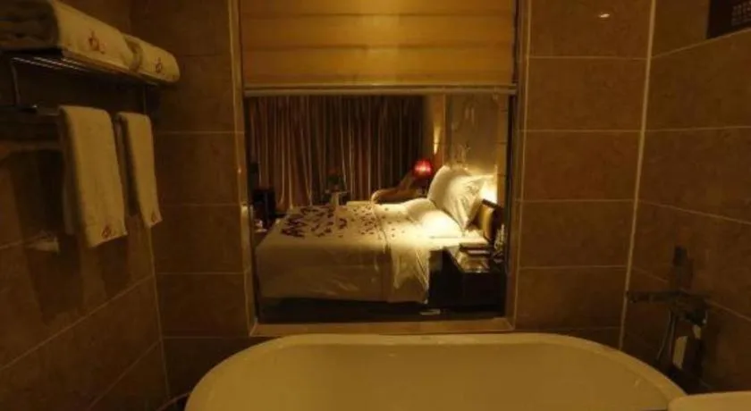 Bed in Xin Sheng Da Hong Sheng International Hotel