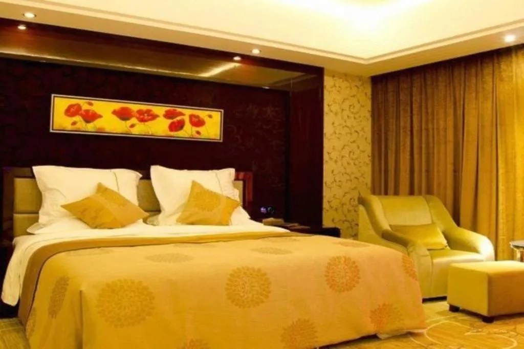 Bed in Xin Sheng Da Hong Sheng International Hotel