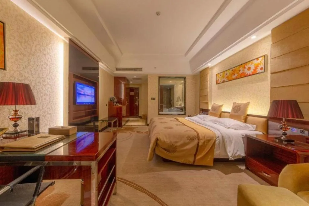 Bed in Xin Sheng Da Hong Sheng International Hotel