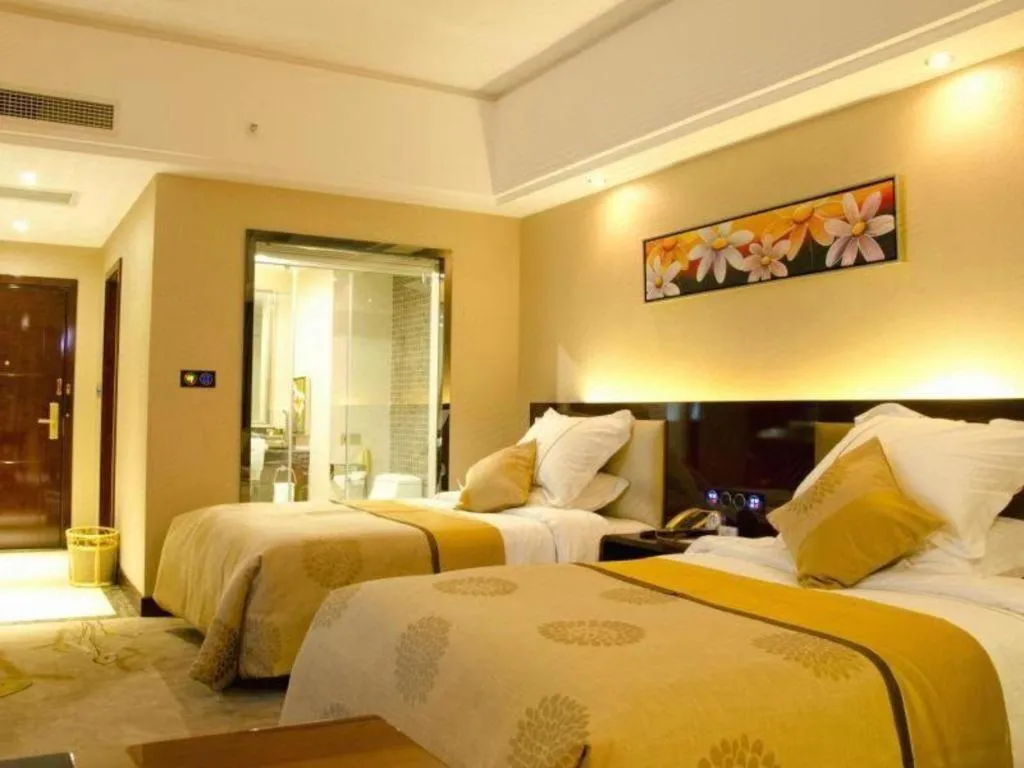 Bed in Xin Sheng Da Hong Sheng International Hotel