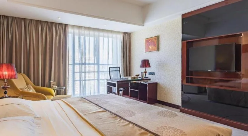 Bed in Xin Sheng Da Hong Sheng International Hotel