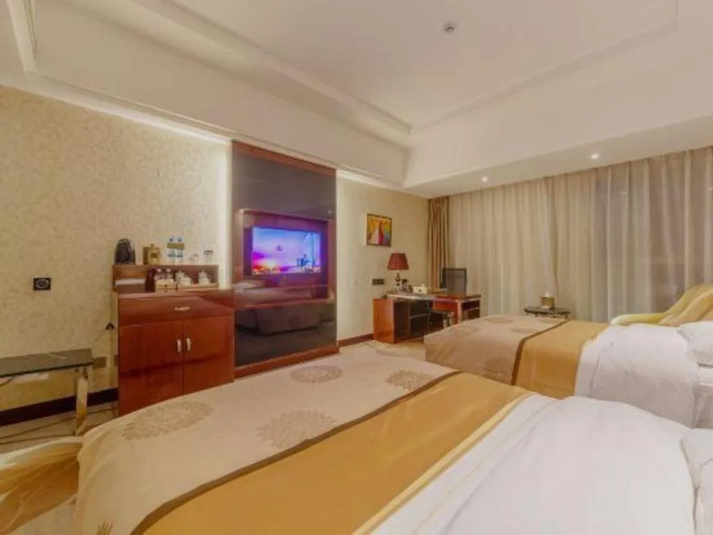 Bed in Xin Sheng Da Hong Sheng International Hotel
