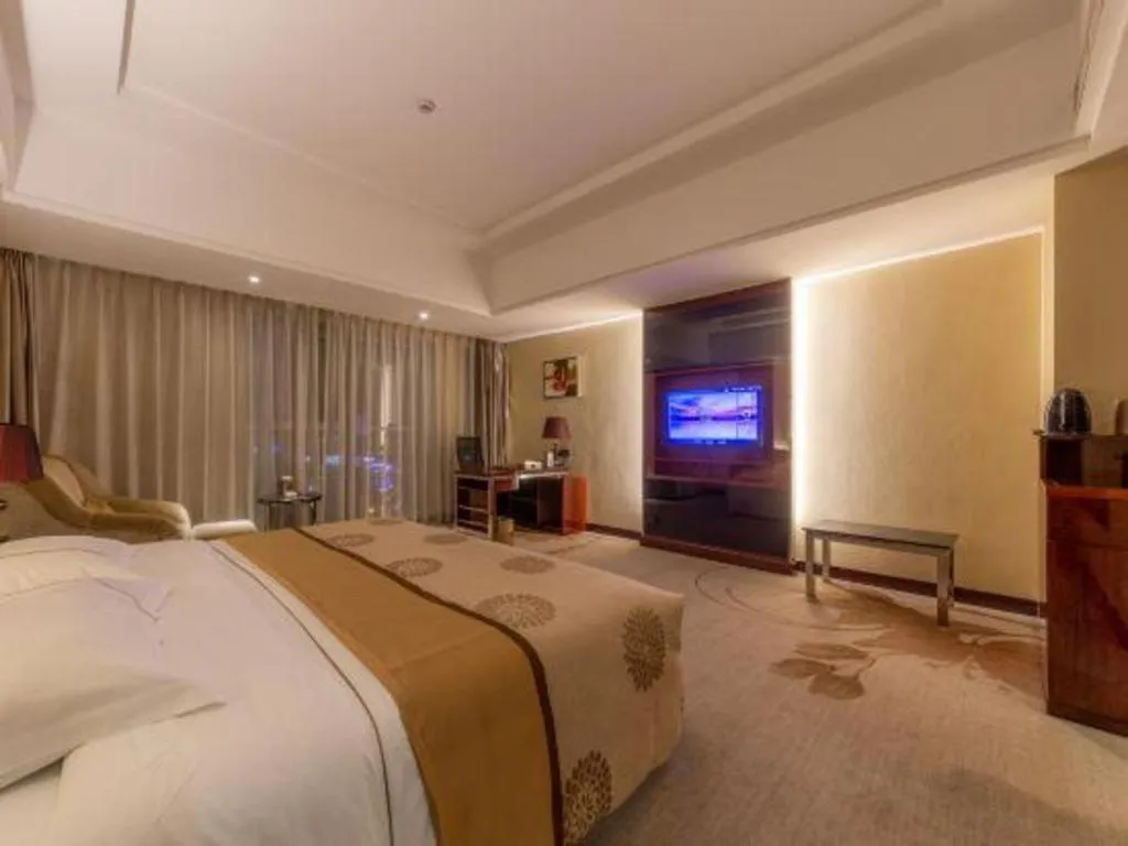 Bed in Xin Sheng Da Hong Sheng International Hotel