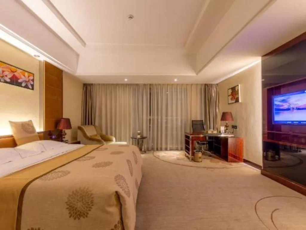 Bed in Xin Sheng Da Hong Sheng International Hotel
