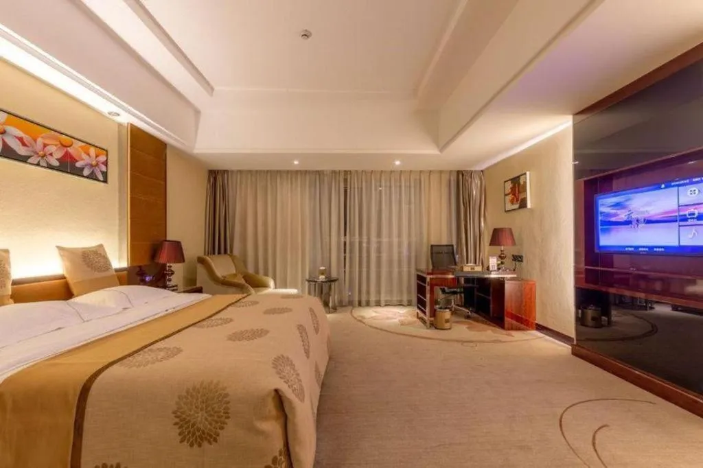 Bed in Xin Sheng Da Hong Sheng International Hotel