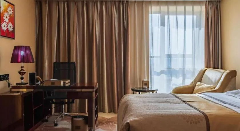 Bed in Xin Sheng Da Hong Sheng International Hotel