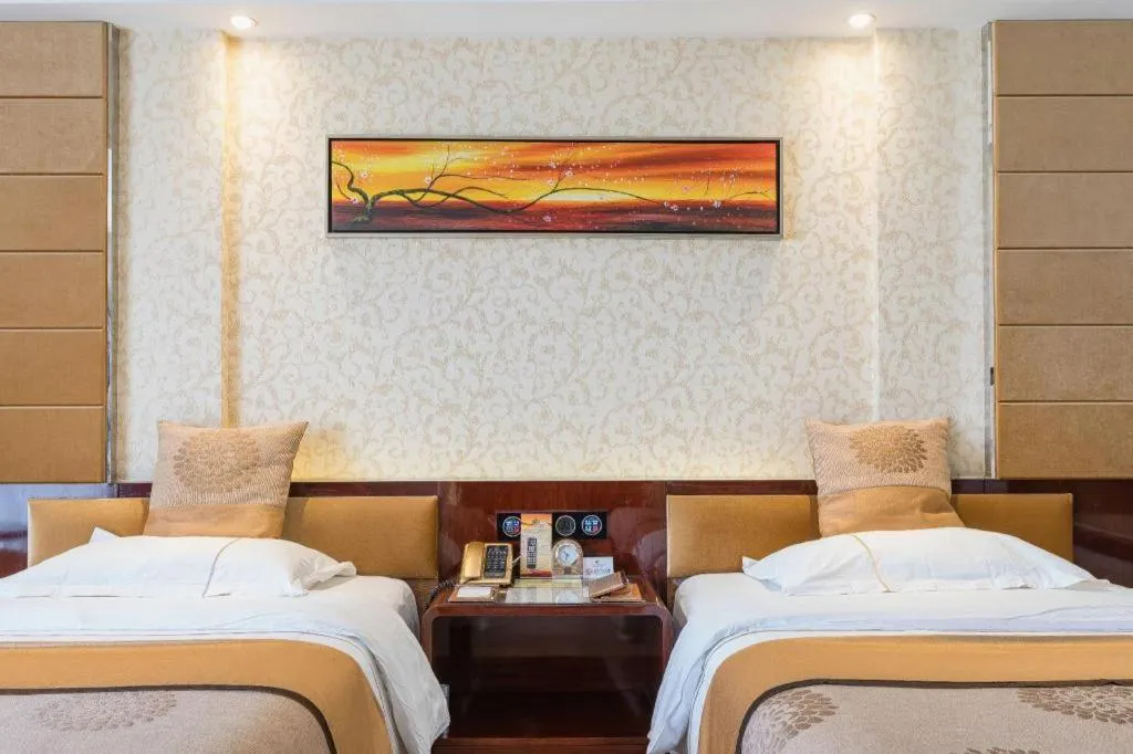 Bed in Xin Sheng Da Hong Sheng International Hotel